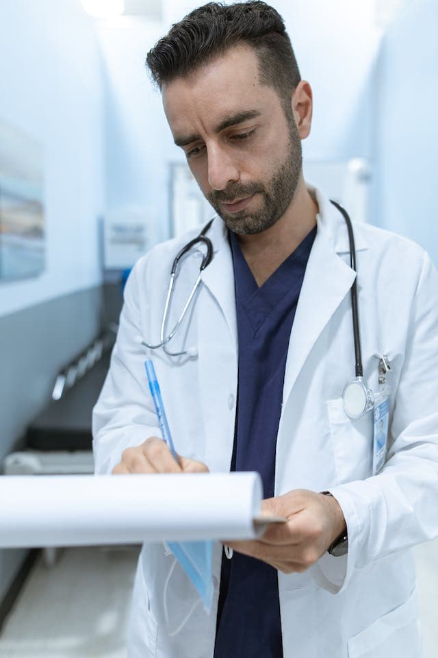 a doctor reading a document