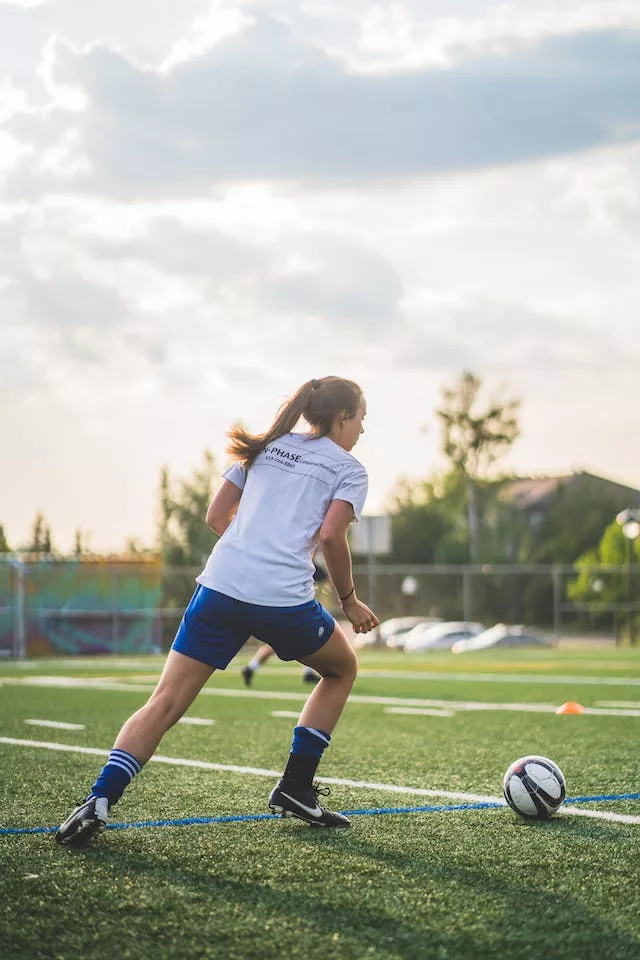 a woman playing football