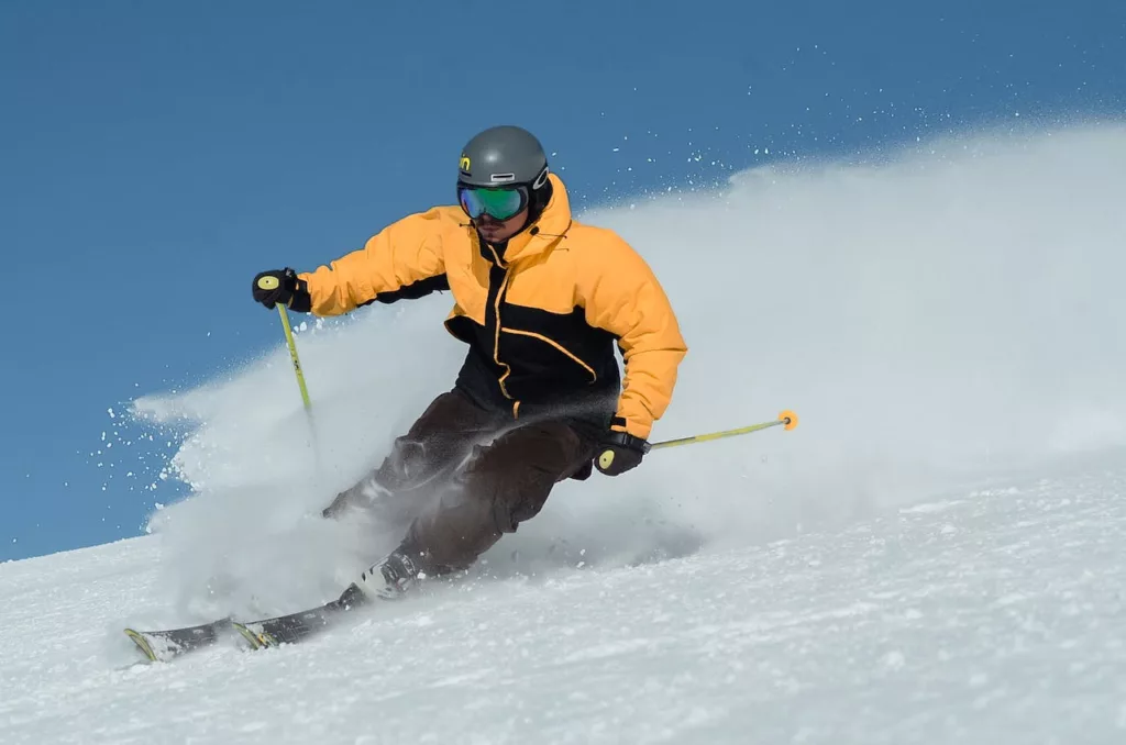 man skiing. ACL injuries in skiing