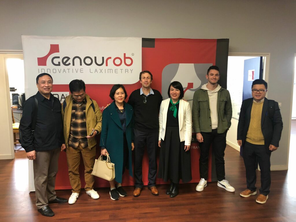 vietnam doctors in front of genourob logo